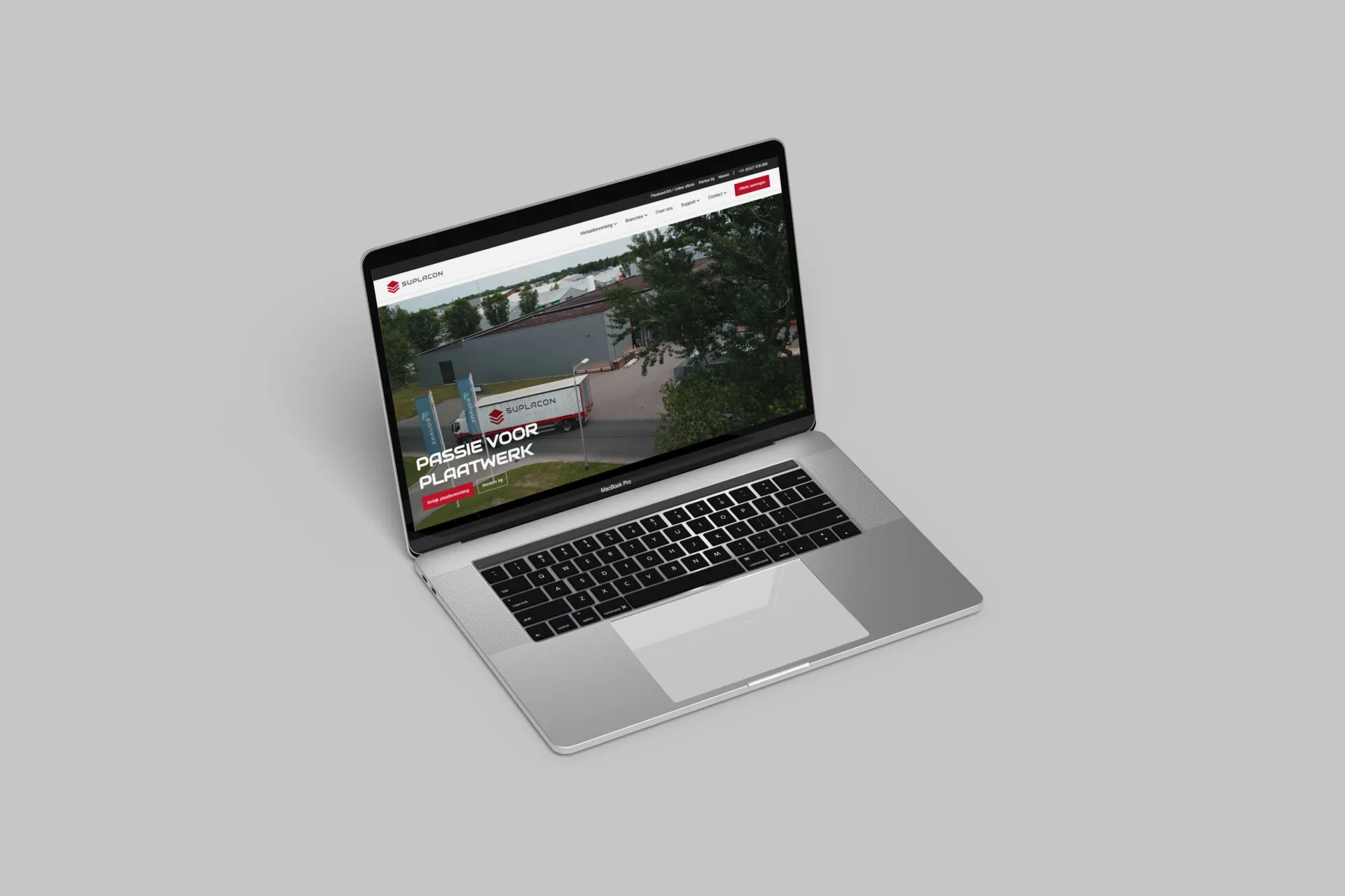 Suplacon website shown in a laptop case-study mockup